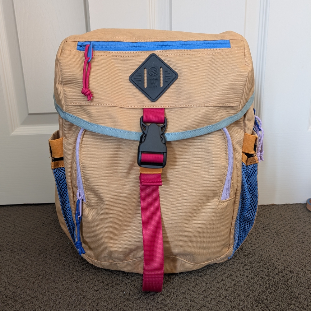 Stylish Tan Backpack with Colorful Accents